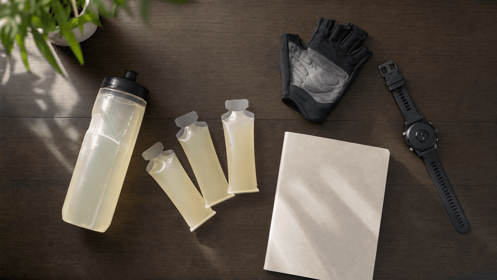 Unbranded carbohydrate-fuelling kit arranged for a triathlon training ride